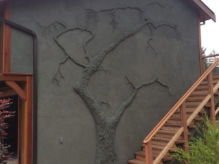 JP iphone 2-19 876 A house with tree-shaped decorative stucco siding